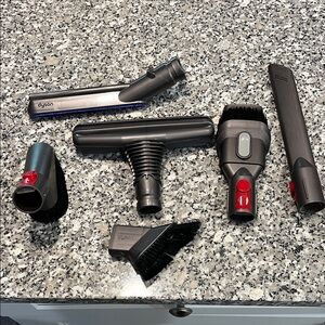 Dyson Cleaning Attachments in Gray and Red